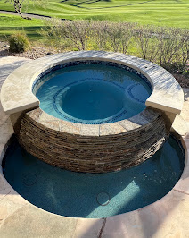 Custom spa and pool combo with clear blue water in Indio, California