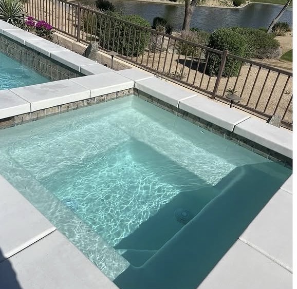 Crystal clear spa with desert landscape view